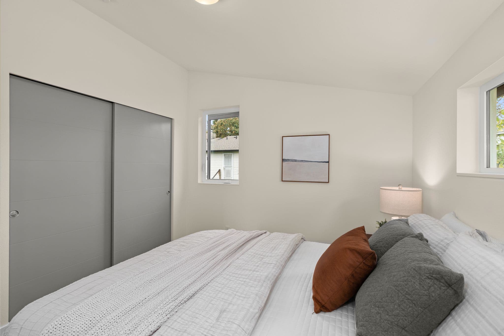 Bedroom with sliding closet doors