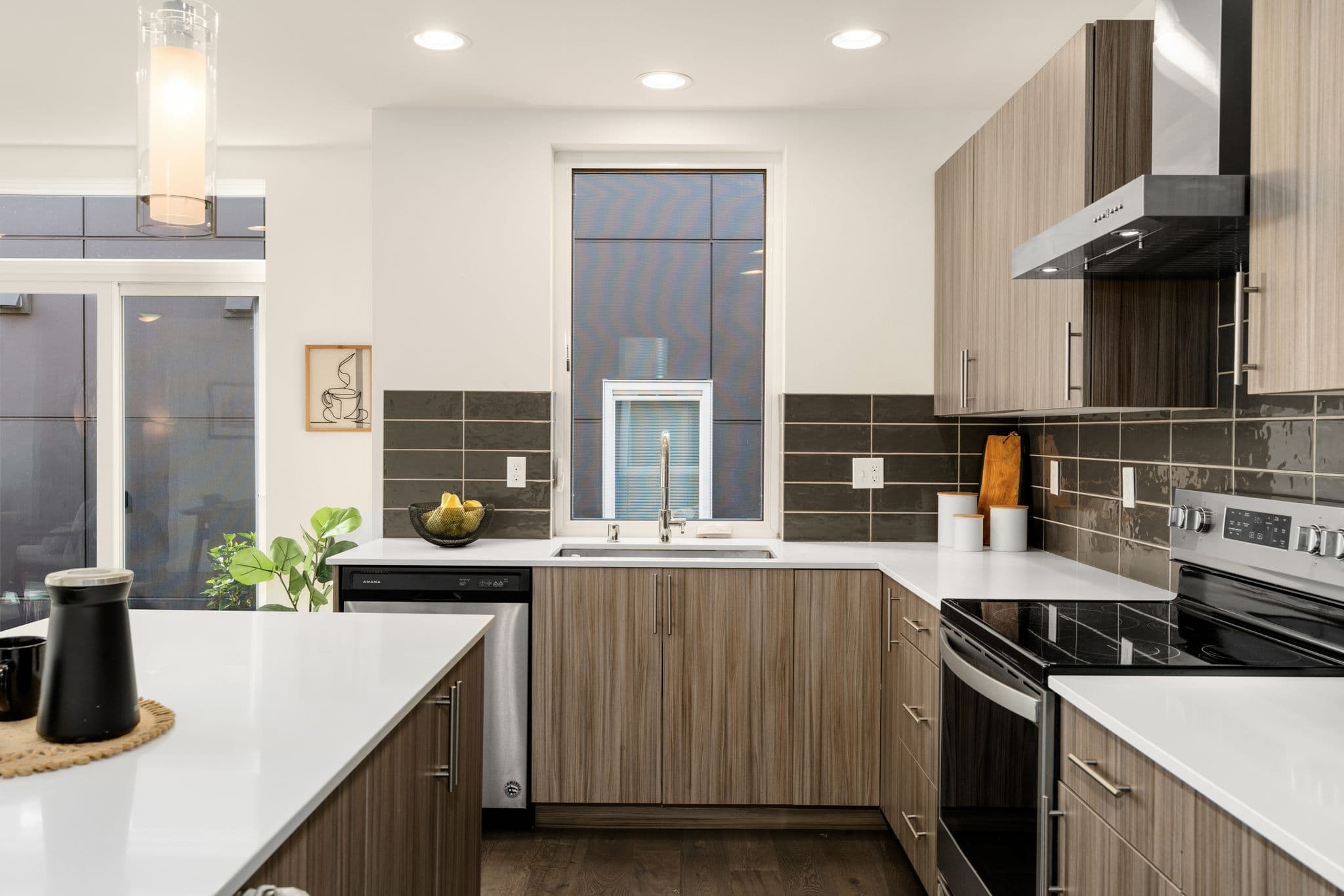 Kitchen sink and tile backsplash